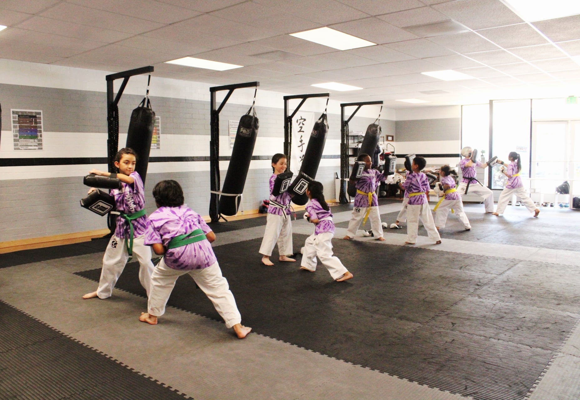 Karate belt promotion ceremony at Kombat Karate Academy in Long Beach