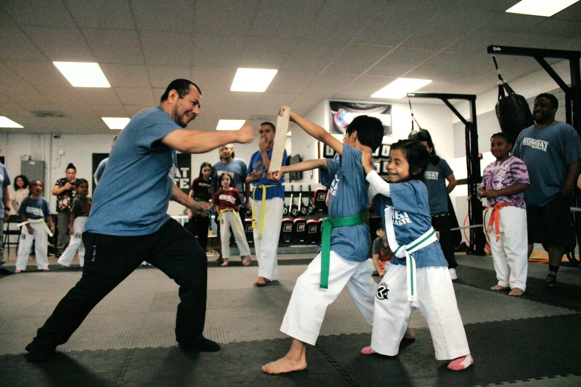 Teens and adults karate class training together in Long Beach, CA