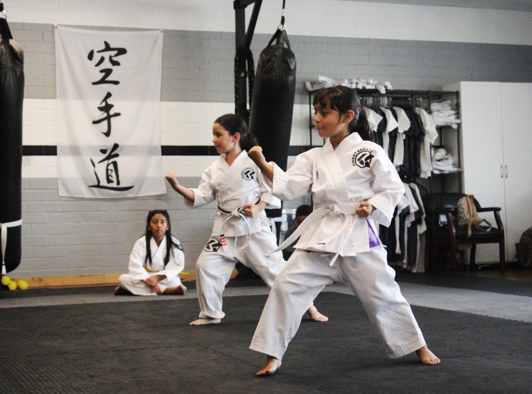 Karate sparring drill with protective gear at our Long Beach dojo