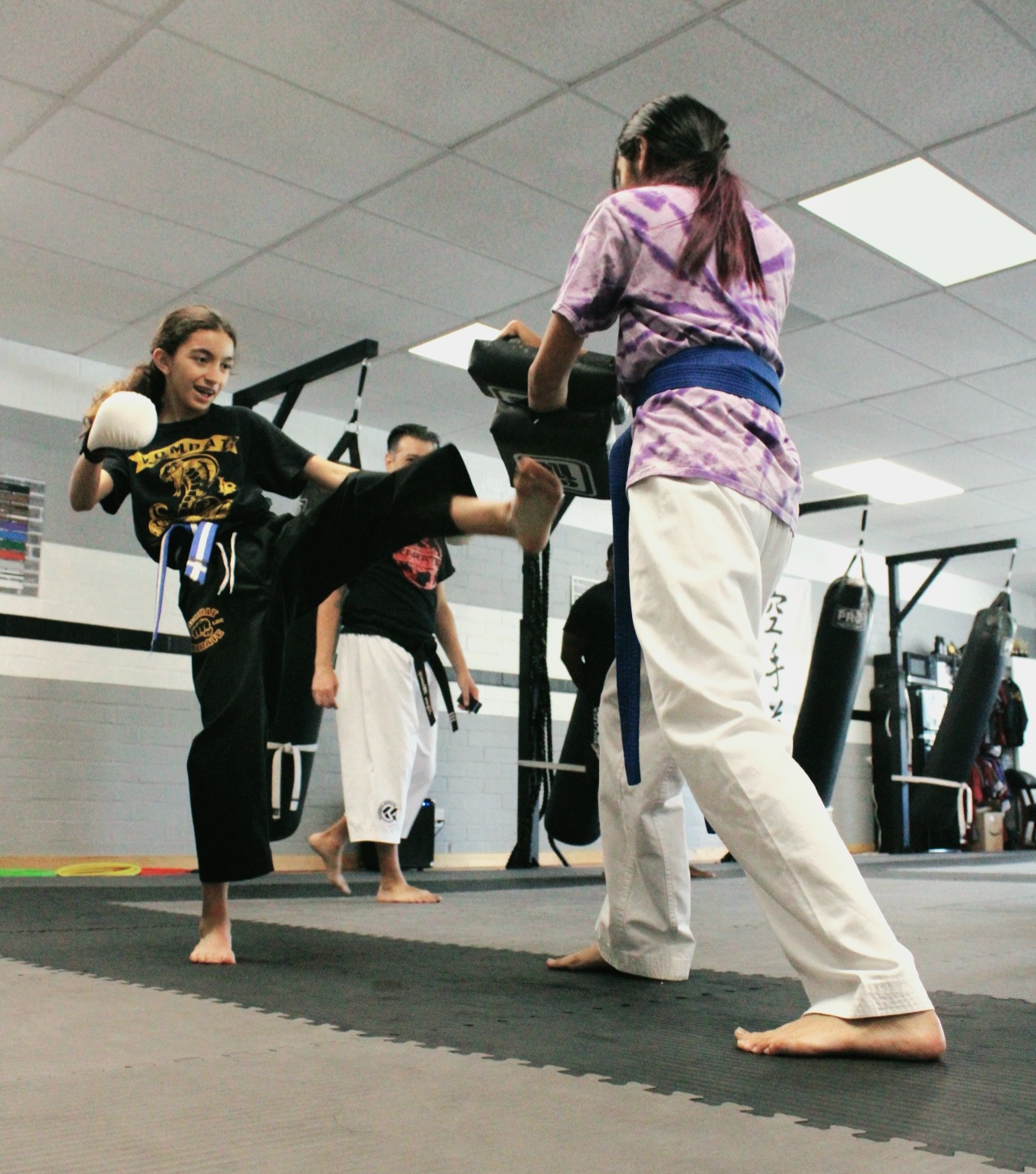 Kadets karate students lined up on the mat at Kombat Karate Long Beach