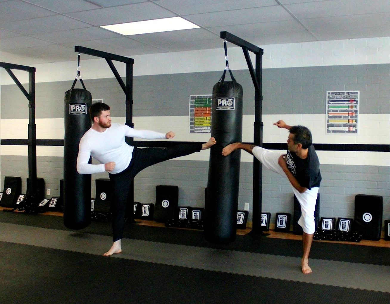 Adult kickboxing pad work and conditioning at Kombat Karate in Long Beach, CA